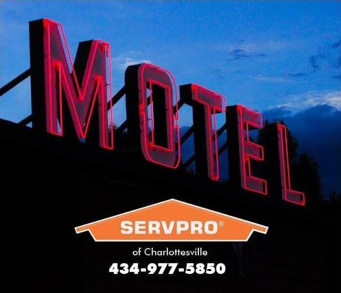 motel sign against night sky 